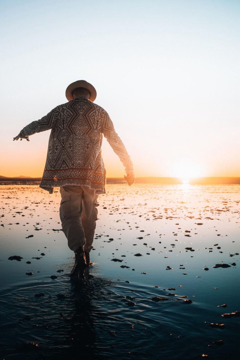 a man walking on a beach